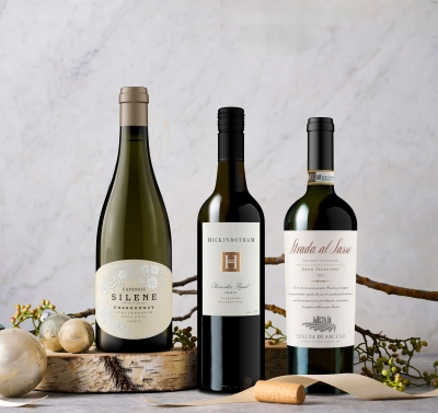 Collection of wines against a gray background