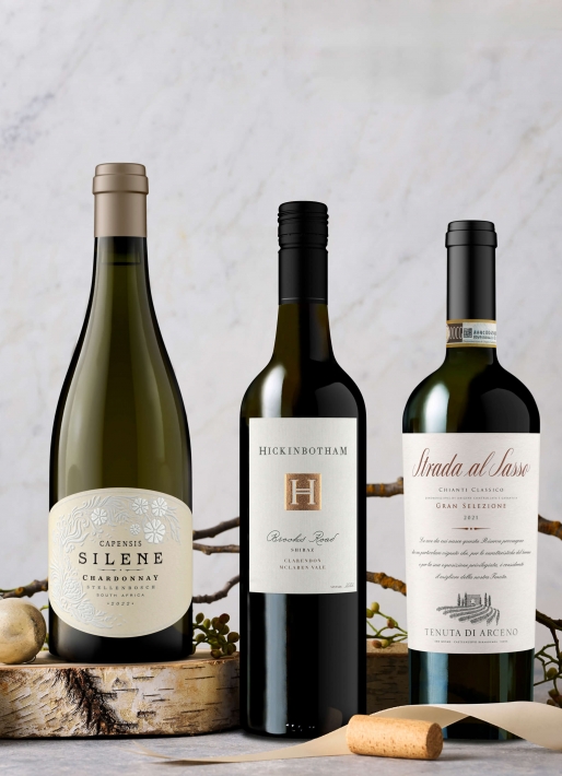 Collection of wines against a gray background